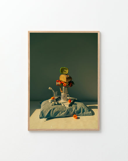 The Its Time to Wake Up Poster features a playful, surreal breakfast still life with a mug balancing a can, bread, and cherry tomatoes on a pillow. A metal watering can and more tomatoes complete the scene, making it ideal for retro photography lovers or as quirky kitchen wall decor.