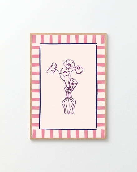 The Poppies en Vase Poster showcases a minimalist line drawing of flowers in a vase, embracing a floral motif, with alternating pink and red striped borders. Set against a plain white background, it complements any modern style.