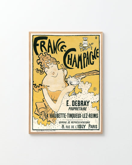 The France-Champagne Poster is a vintage Art Nouveau piece featuring a woman with a flute of French champagne. Highlighting E. Debray, proprietor, it showcases a whimsical style with a yellow and cream color scheme and includes an address in Paris.