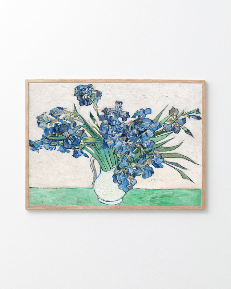 Framed artwork of Van Gogh's 'Irises' on a white background