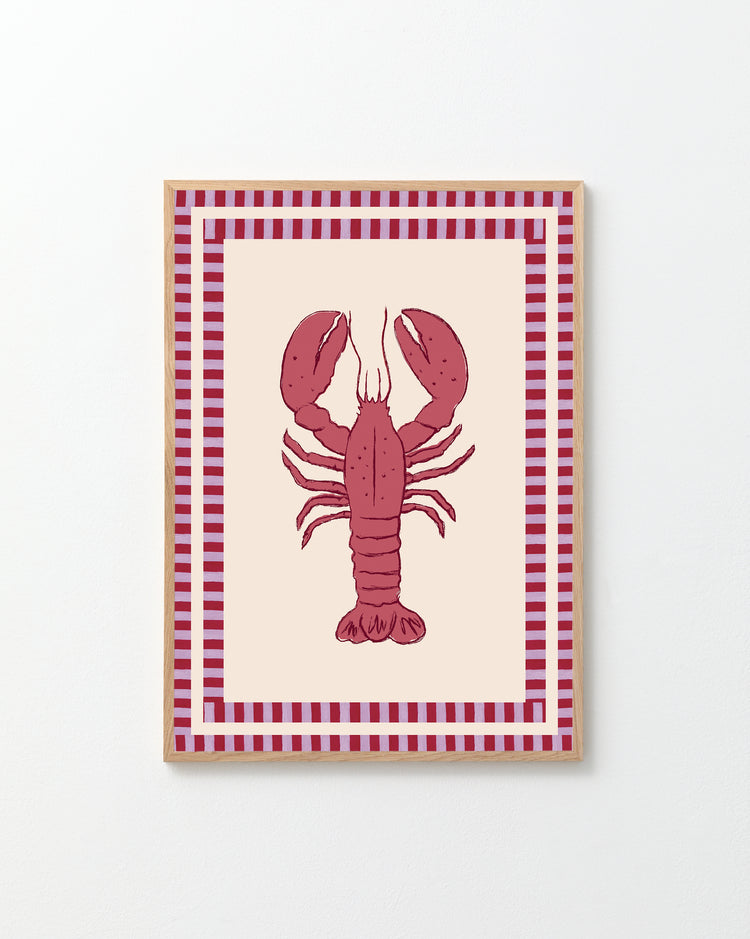 The Le Stripy Homard Poster showcases a stunning collage of a red lobster centered on a white background, encased in a red and white checkered frame, and displayed on a plain white wall.