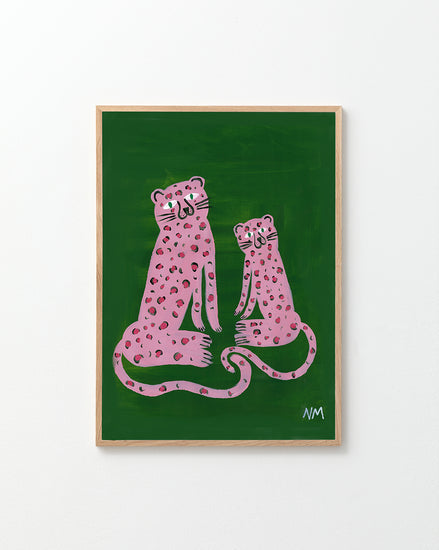 poster with two painted pink leopards, in a oak frame