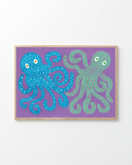 poster of octopuses in a oak frame