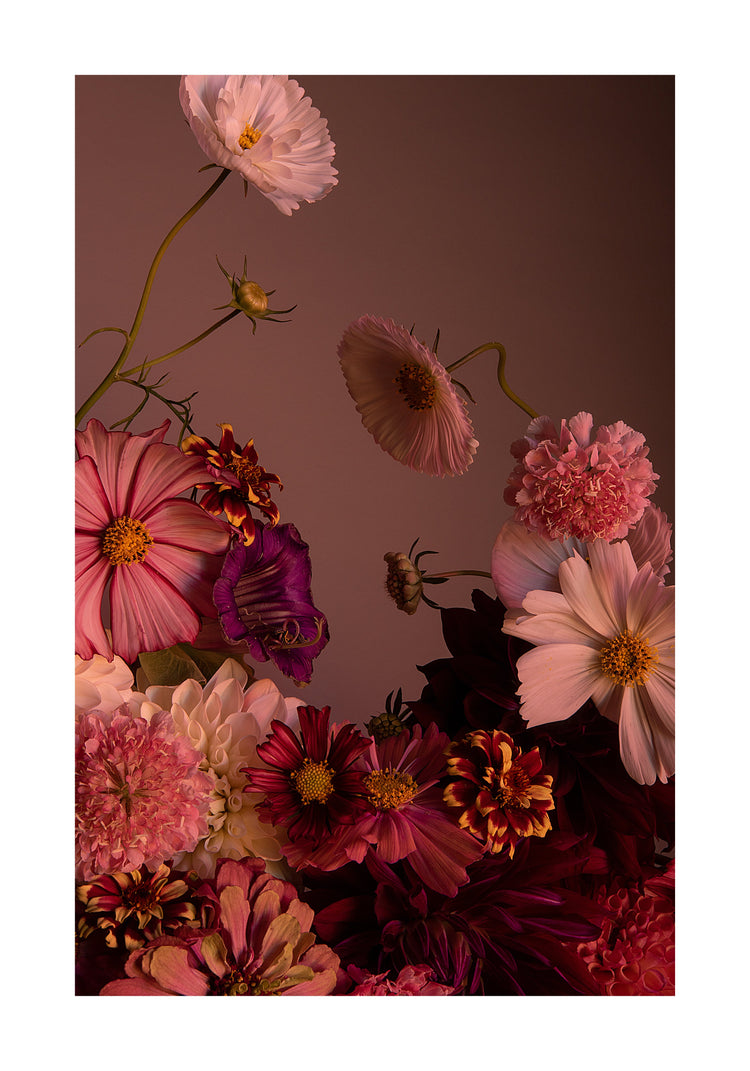 The Dreamscape Poster showcases a beautifully arranged bouquet featuring pink, purple, and deep red flowers against a soft background. With cosmos and zinnias, it crafts an elegant floral landscape that highlights natures finest blooms in harmony.
