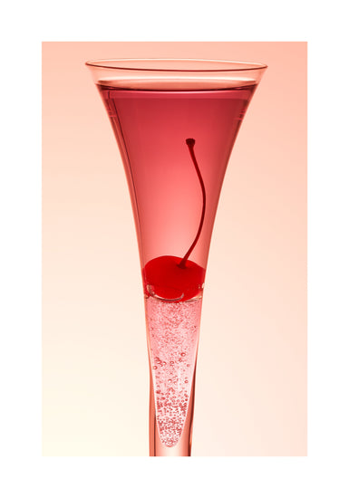 An eye-catching still life photograph showcasing a close-up of a drink adorned with a delectable cherry against a vibrant pink background. White border.