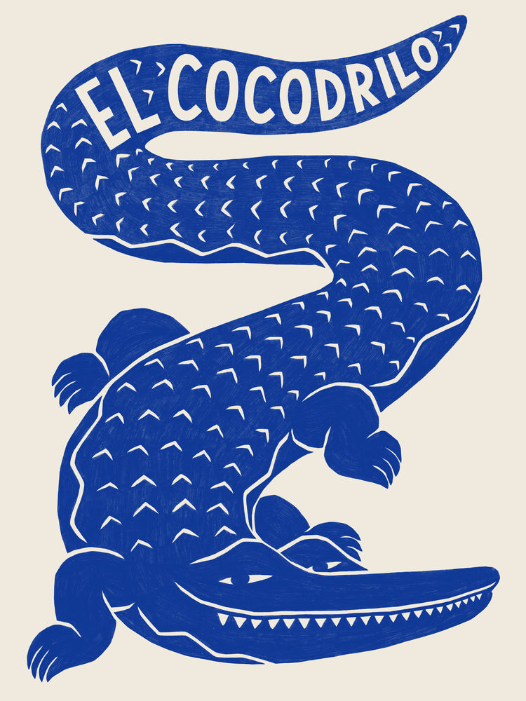 The El Cocodrilo Poster showcases a blue crocodile with El Cocodrilo in white on its tail. This stylized and simplistic wall art is adorned with white accents that enhance the unique superstar charm of the crocodile design.