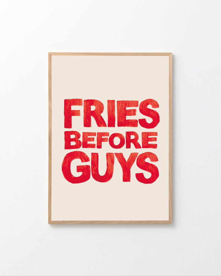 The Fries Before Guys poster is hand-painted, featuring bold red letters on a light beige background.