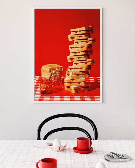 Poster "Jam Sandwiches" in a white frame above a breakfast table