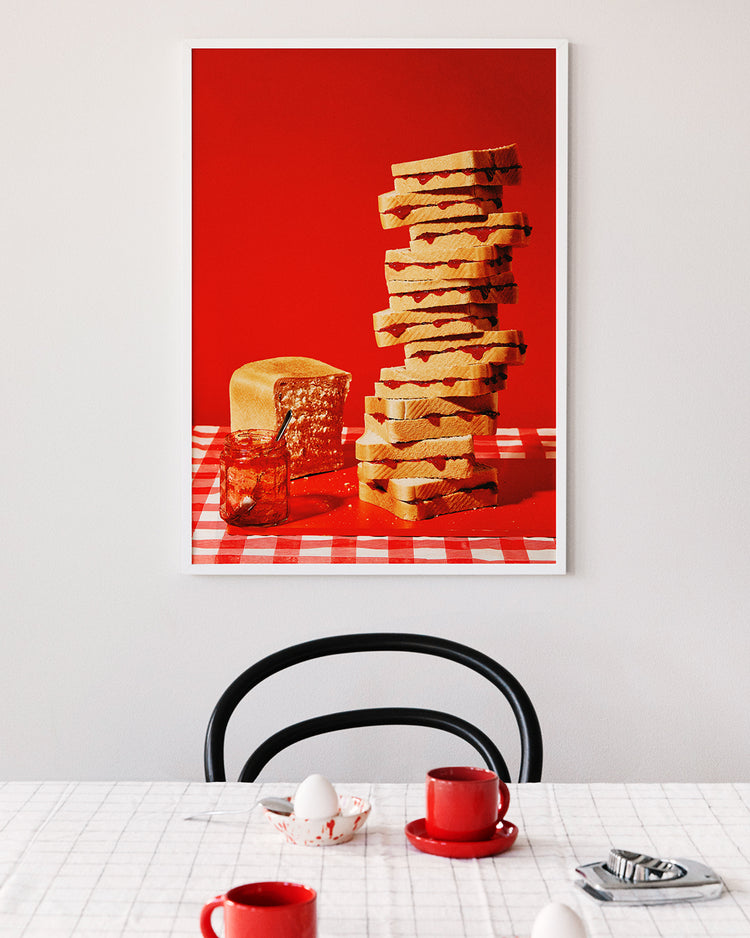 Poster "Jam Sandwiches" in a white frame above a breakfast table