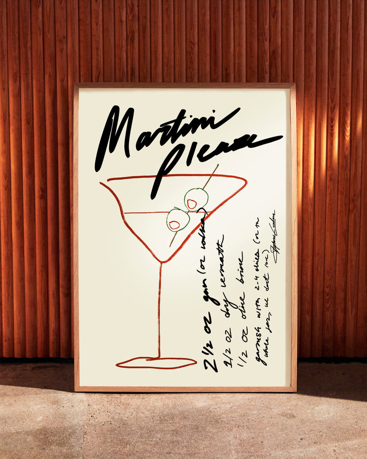 The Martini Please Poster features a chic digital illustration with a minimalist line drawing of a martini glass and two olives, surrounded by handwritten text, creating an artful martini recipe vibe.