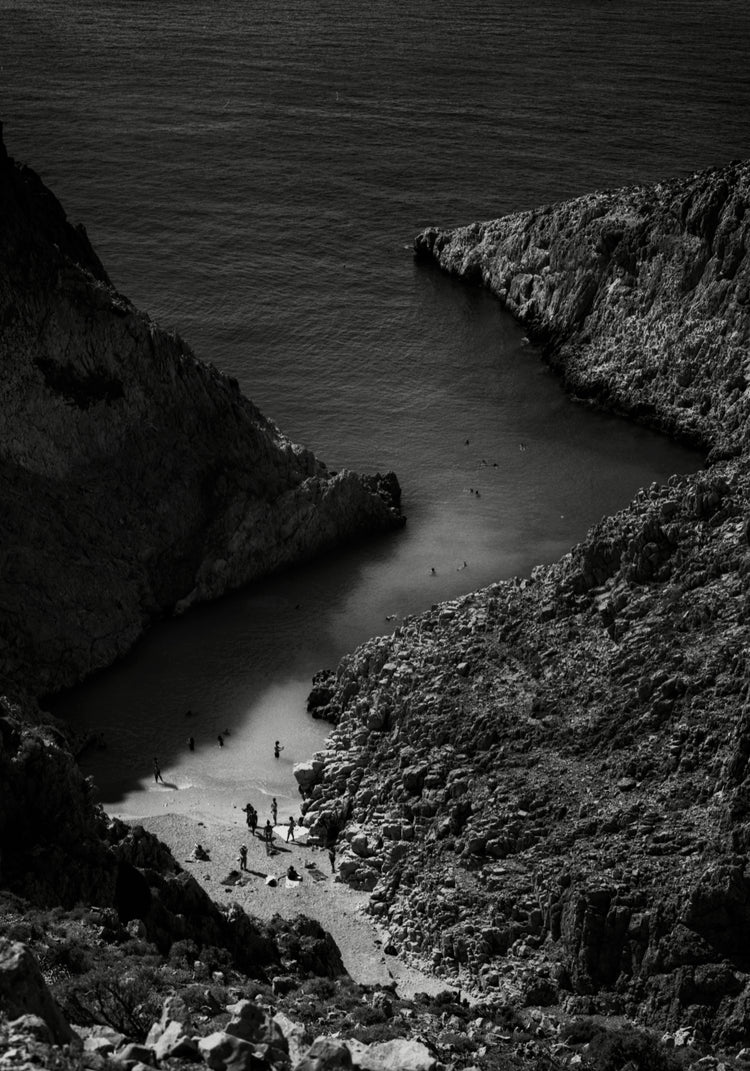 Small, secret beach squeezed between huge mountains.