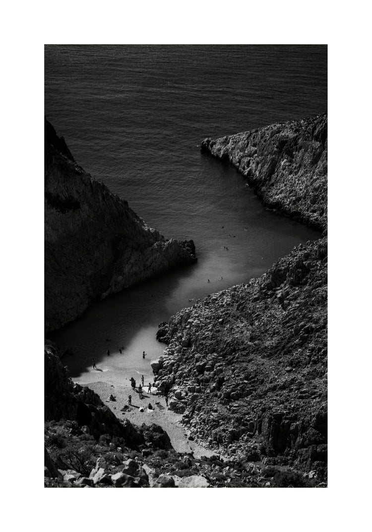 Small, secret beach squeezed between huge mountains.