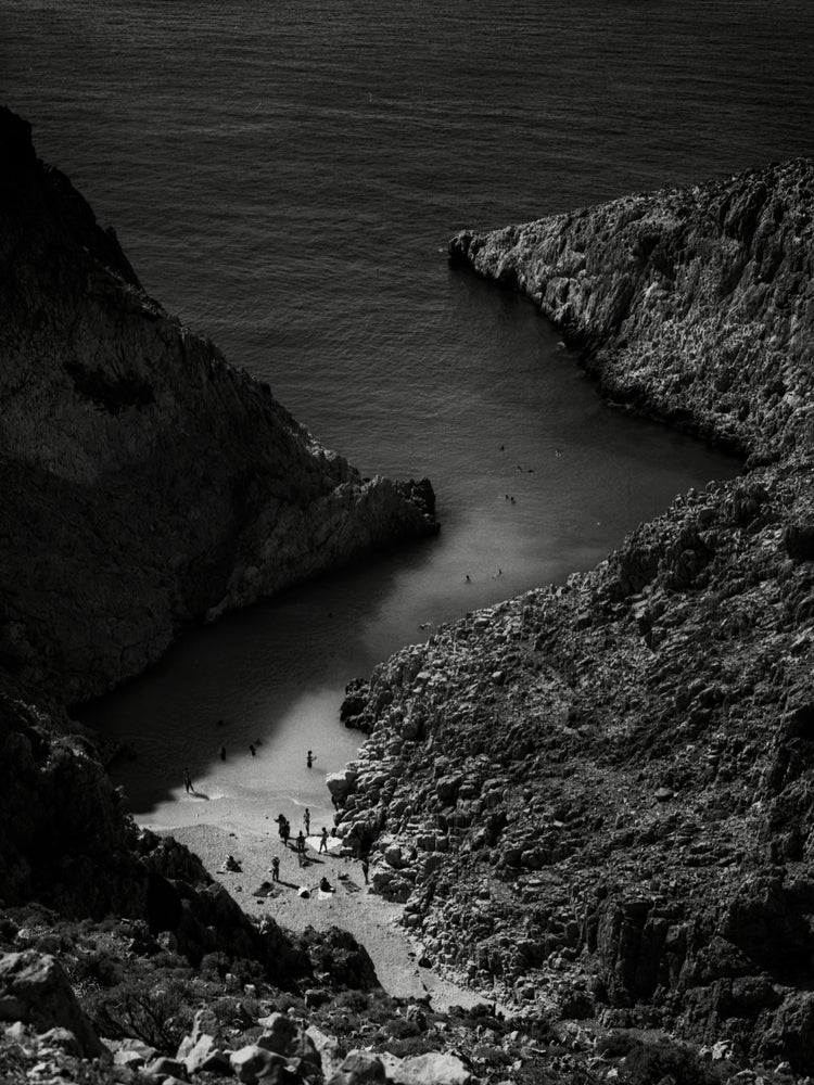 Small, secret beach squeezed between huge mountains.