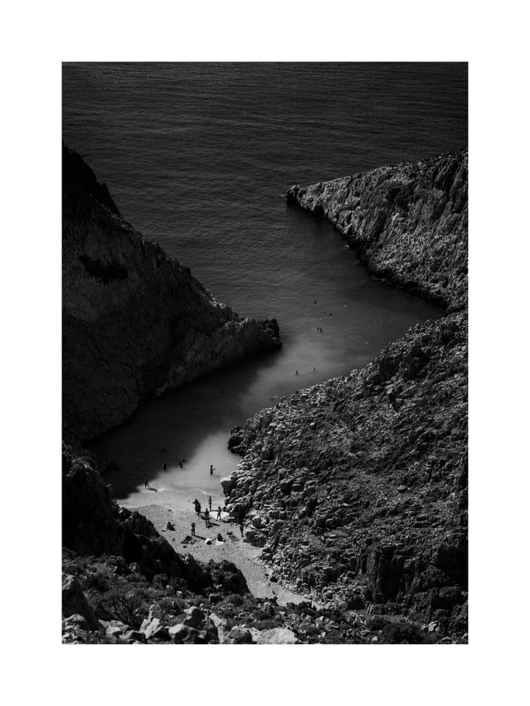 Small, secret beach squeezed between huge mountains.