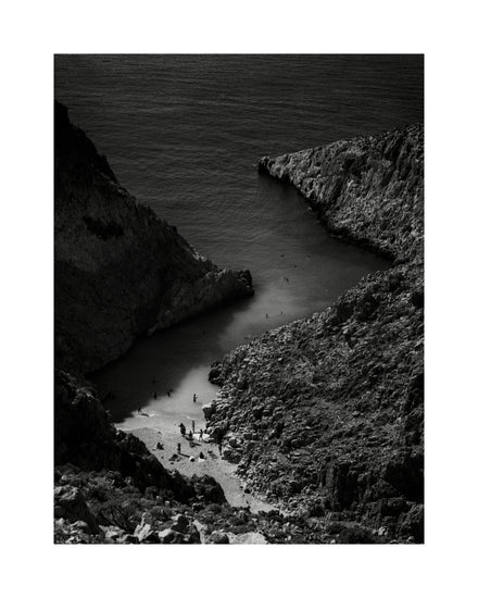 Small, secret beach squeezed between huge mountains.