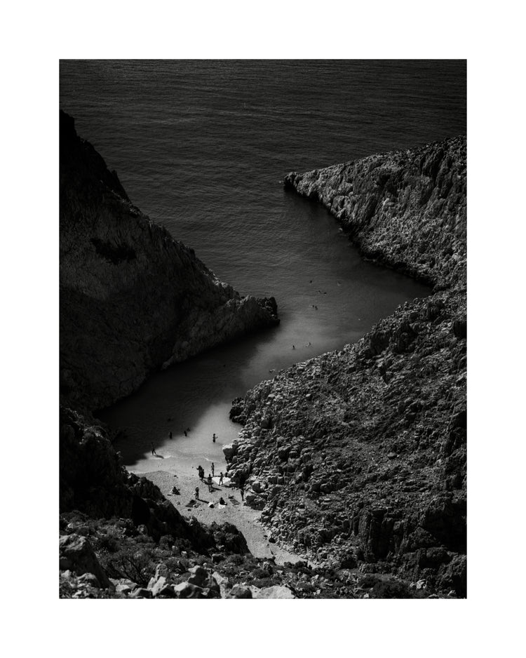 Small, secret beach squeezed between huge mountains.