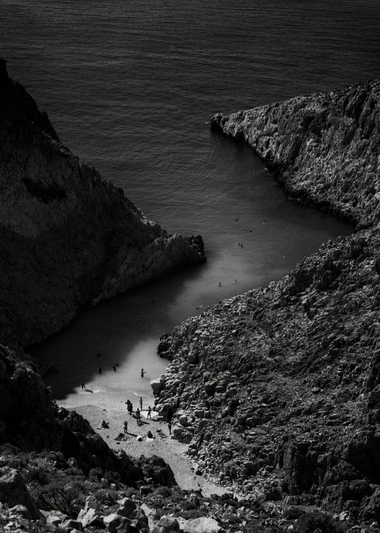 Small, secret beach squeezed between huge mountains.