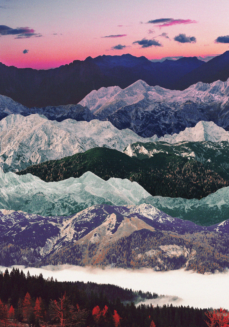 Colorful mountain scenery with a pink sky and a forest set in a valley below.