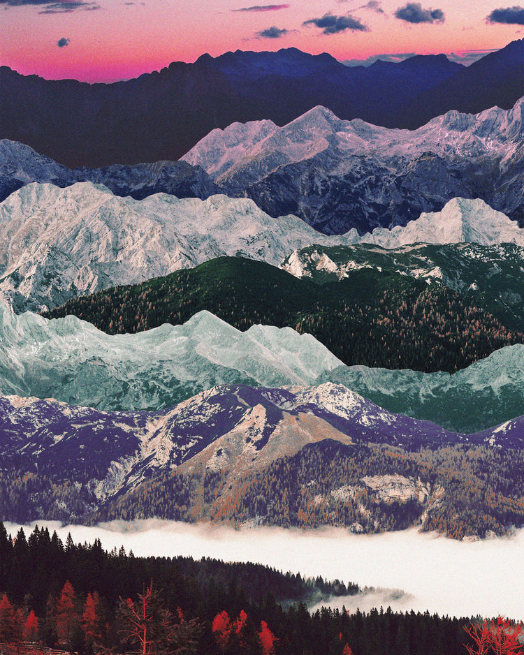 Colorful mountain scenery with a pink sky and a forest set in a valley below.