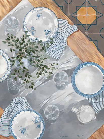 A painting titled The Good Plates Poster features a dining table set with blue and white floral design plates, glasses, a striped napkin, a small jug, and a leafy plant in a vase, all elegantly reflected on the table above the tiled floor.