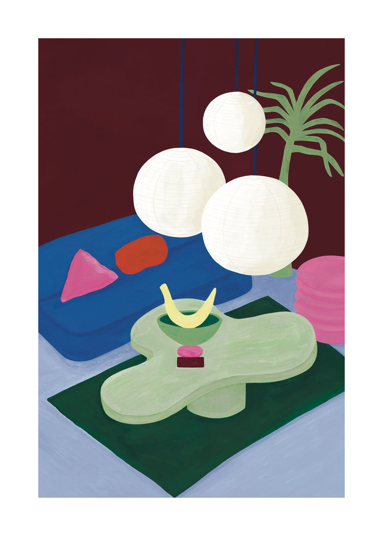The Colourful Living 01 Poster features a modern interior scene with a blue couch accented by colorful cushions, a green abstract coffee table holding a banana and cube, hanging spherical lights, and a minimalist plant set against a deep red wall. Ideal for celebrating vivid multicolored themes.