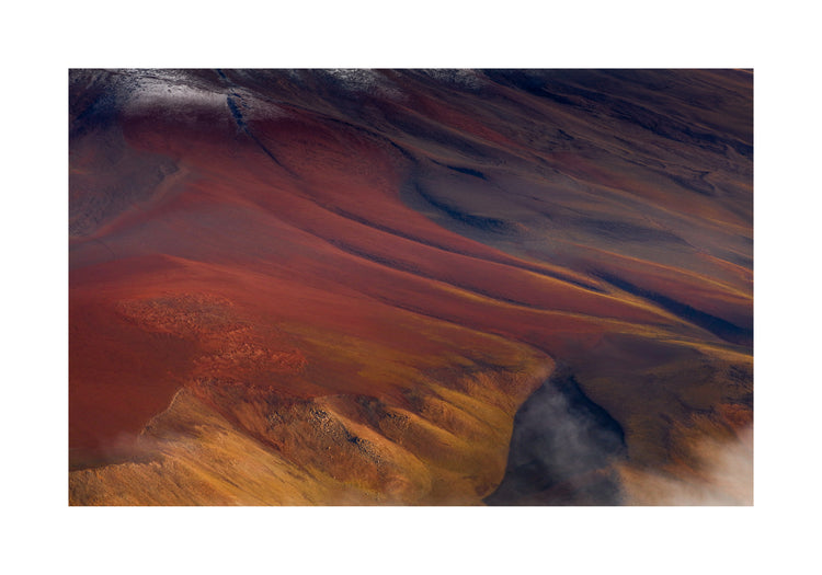 Mountain scenery full of minerals looking like a crater on mars.