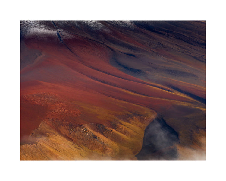 Mountain scenery full of minerals looking like a crater on mars.