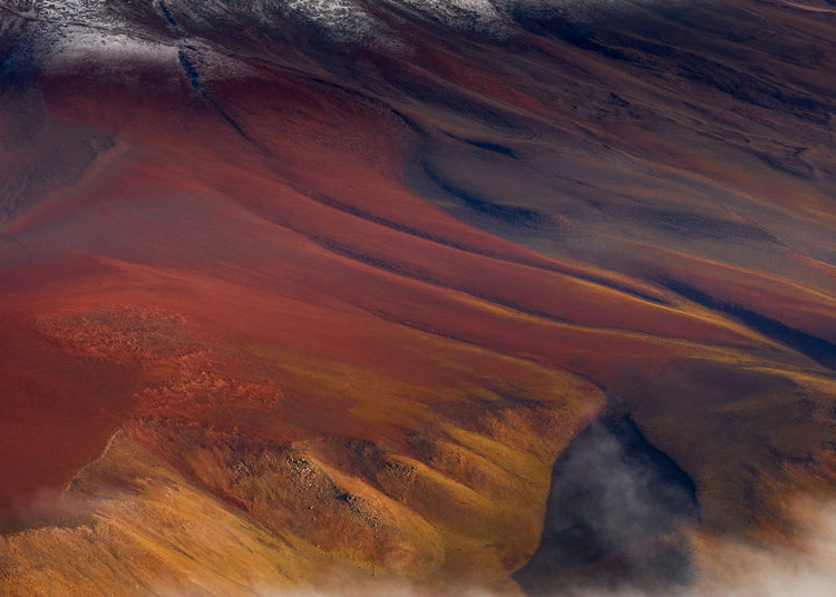 Mountain scenery full of minerals looking like a crater on mars.