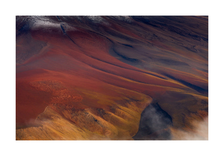 Mountain scenery full of minerals looking like a crater on mars.