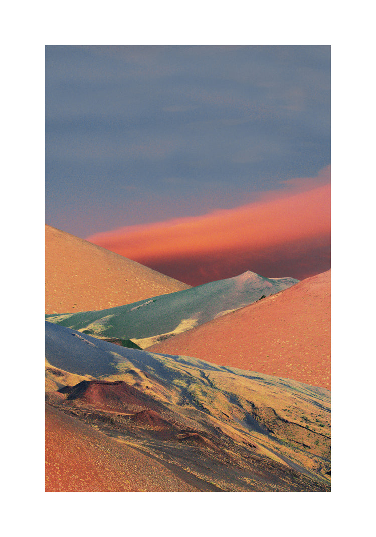 Colorful mountain scenery sparkling under a blue sky with crimson clouds.