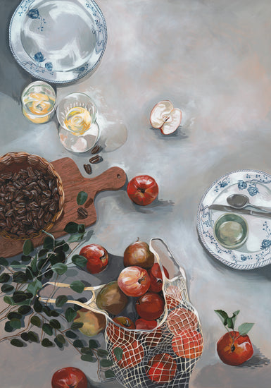 The How Do You Like These Apples Poster features a cozy kitchen table with a still life of red apples, sliced fruit, drinks in glasses, and a basket of nuts. A net bag holds extra apples, while two plates—one with a spoon—and leafy branches enhance the warm decor.