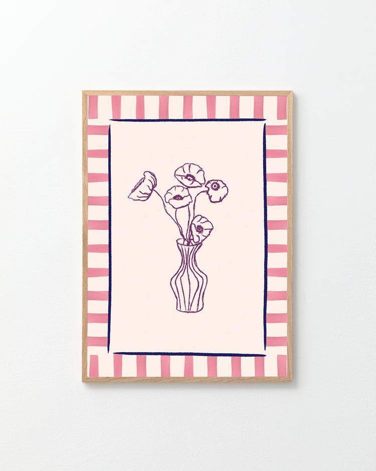 The Poppies en Vase Poster showcases a minimalist line drawing of flowers in a vase, embracing a floral motif, with alternating pink and red striped borders. Set against a plain white background, it complements any modern style.