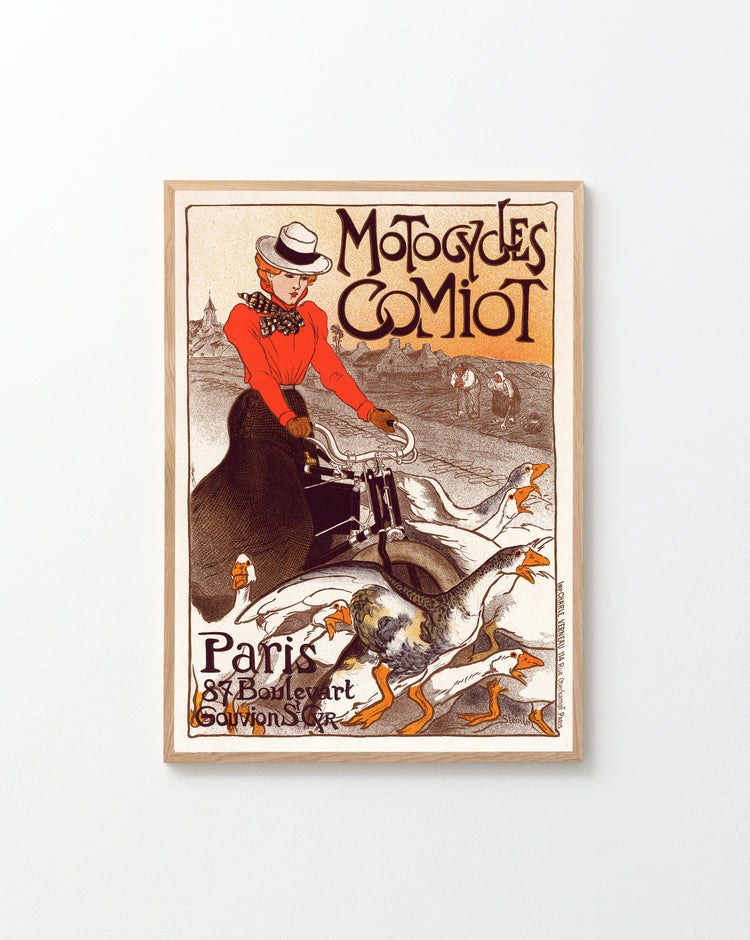 The vintage Motocycles Comiot poster by Théophile-Alexandre Steinlen features a person in a red coat riding a motorcycle among geese, enhanced by Art Nouveau text about Paris. Ideal for home décor, it exudes retro elegance.