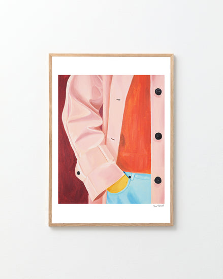 Framed artwork of a pink jacket and blue jeans against a red background.