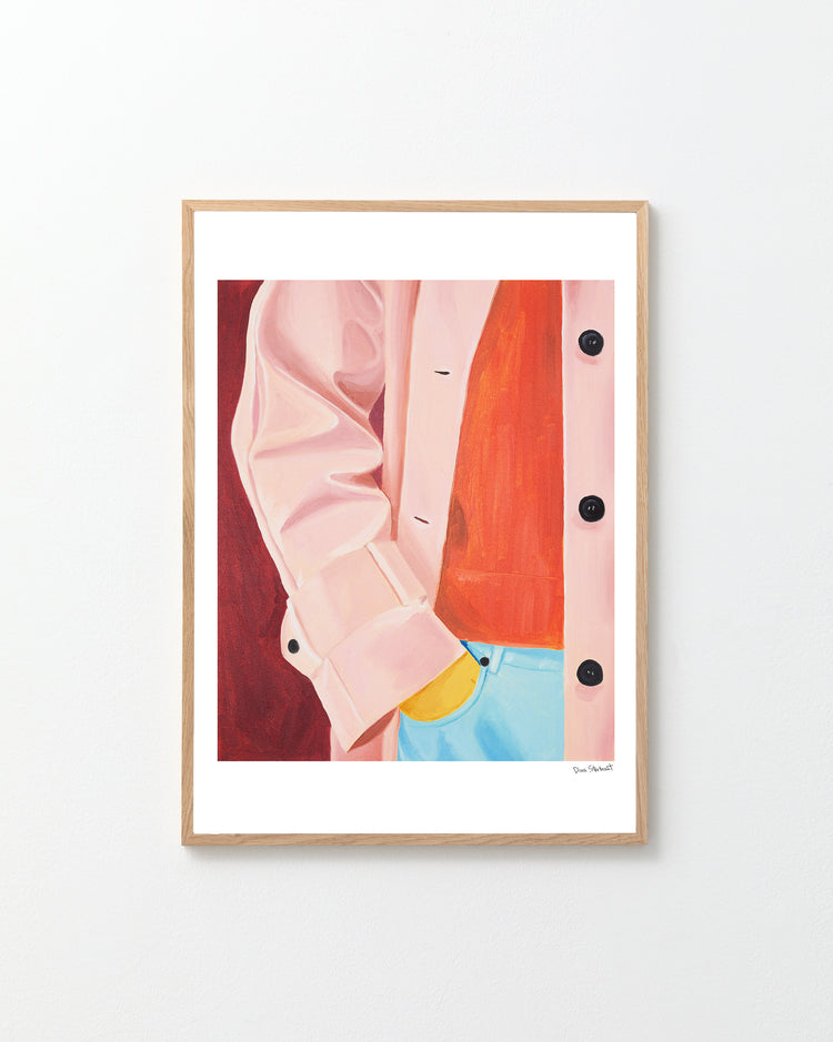 Framed artwork of a pink jacket and blue jeans against a red background.