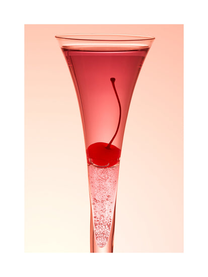 An eye-catching still life photograph showcasing a close-up of a drink adorned with a delectable cherry against a vibrant pink background. White border.