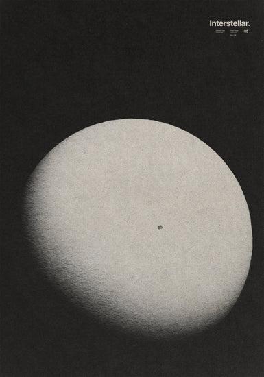 A black canvas with an almost full moon next to the word interstellar.