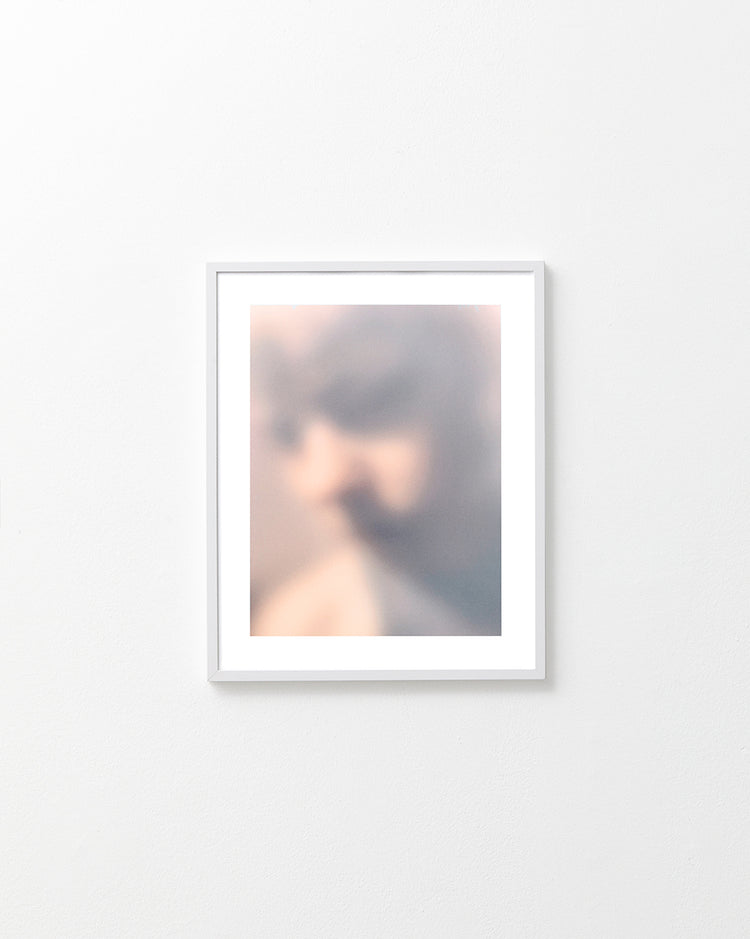 Blurry profile portrait created by using light and shadows to create contrasts.
