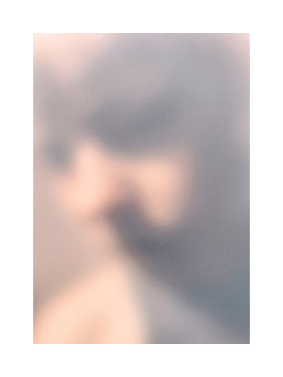 Blurry profile portrait created by using light and shadows to create contrasts.
