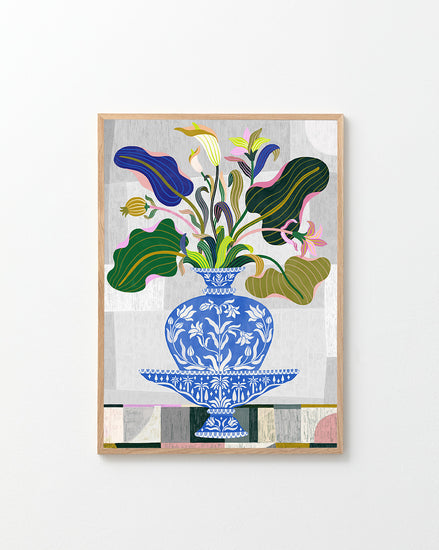 The Vase Poster features a framed floral arrangement in a blue and white decorative vase, echoing Swedish Kurbits style. The flowers vary in shape and color, surrounded by green leaves and pink blossoms against abstract gray and white patterns.