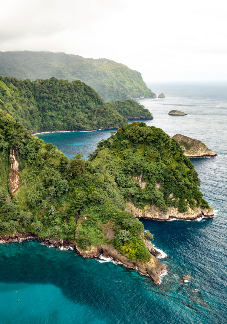 The Caribbean island Tortuga with lush jungle surrounded by turquoise waters