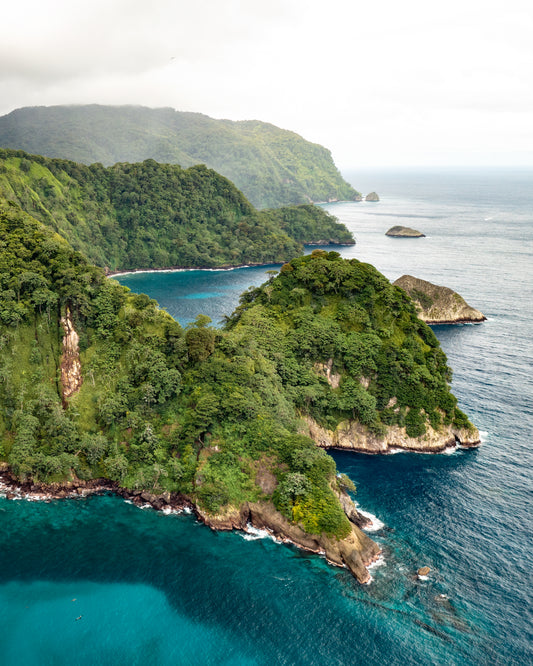 The Caribbean island Tortuga with lush jungle surrounded by turquoise waters
