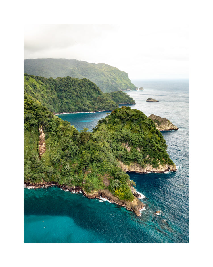 The Caribbean island Tortuga with lush jungle surrounded by turquoise waters