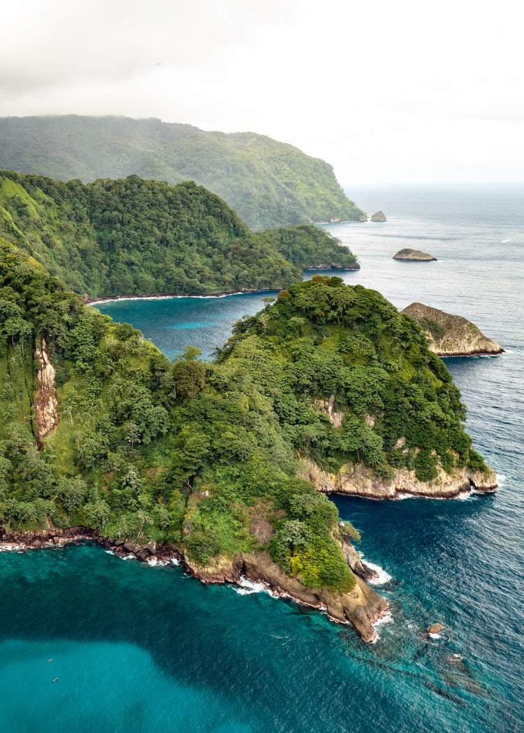 The Caribbean island Tortuga with lush jungle surrounded by turquoise waters