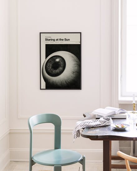 Huge eyeball staring into space headlined with the words staring at the sun.