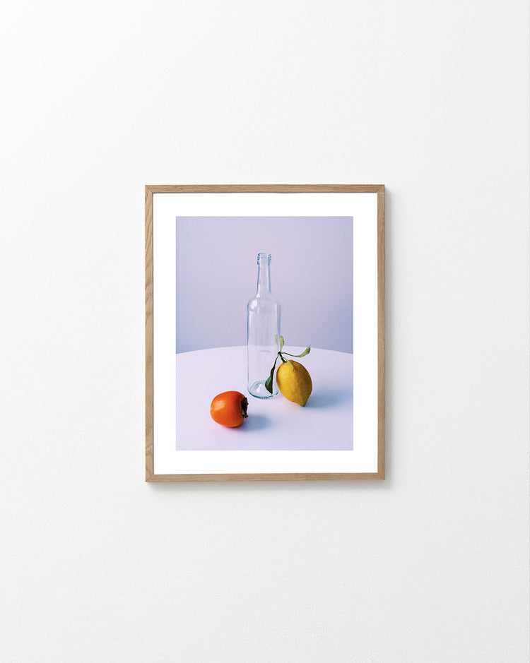 Photo of still life set up of fruits and a bottle looking like a painting.