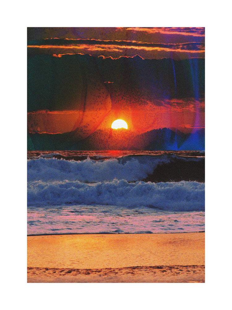 Waves crashing on the shore illuminated by a golden sunset on a cloudy sky.